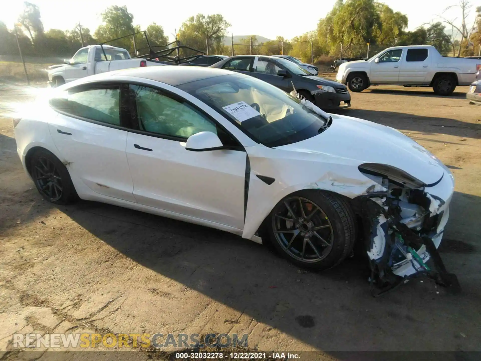 1 Photograph of a damaged car 5YJ3E1EA2MF976956 TESLA MODEL 3 2021