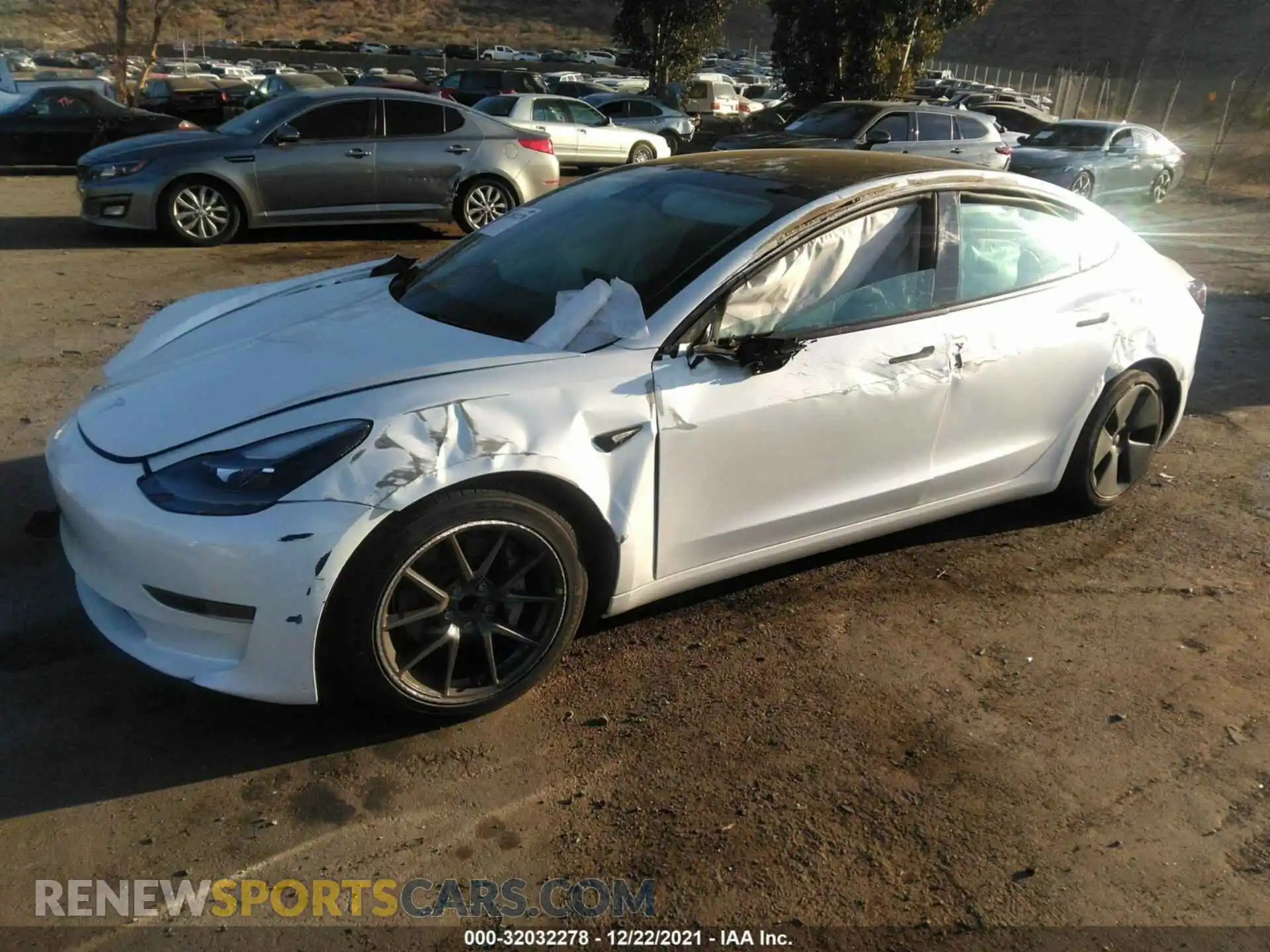 2 Photograph of a damaged car 5YJ3E1EA2MF976956 TESLA MODEL 3 2021