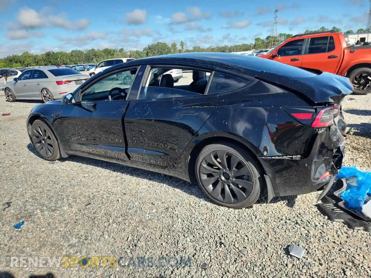 2 fotografías del automóvil dañado 5YJ3E1EA2MF977282 TESLA MODEL 3 2021