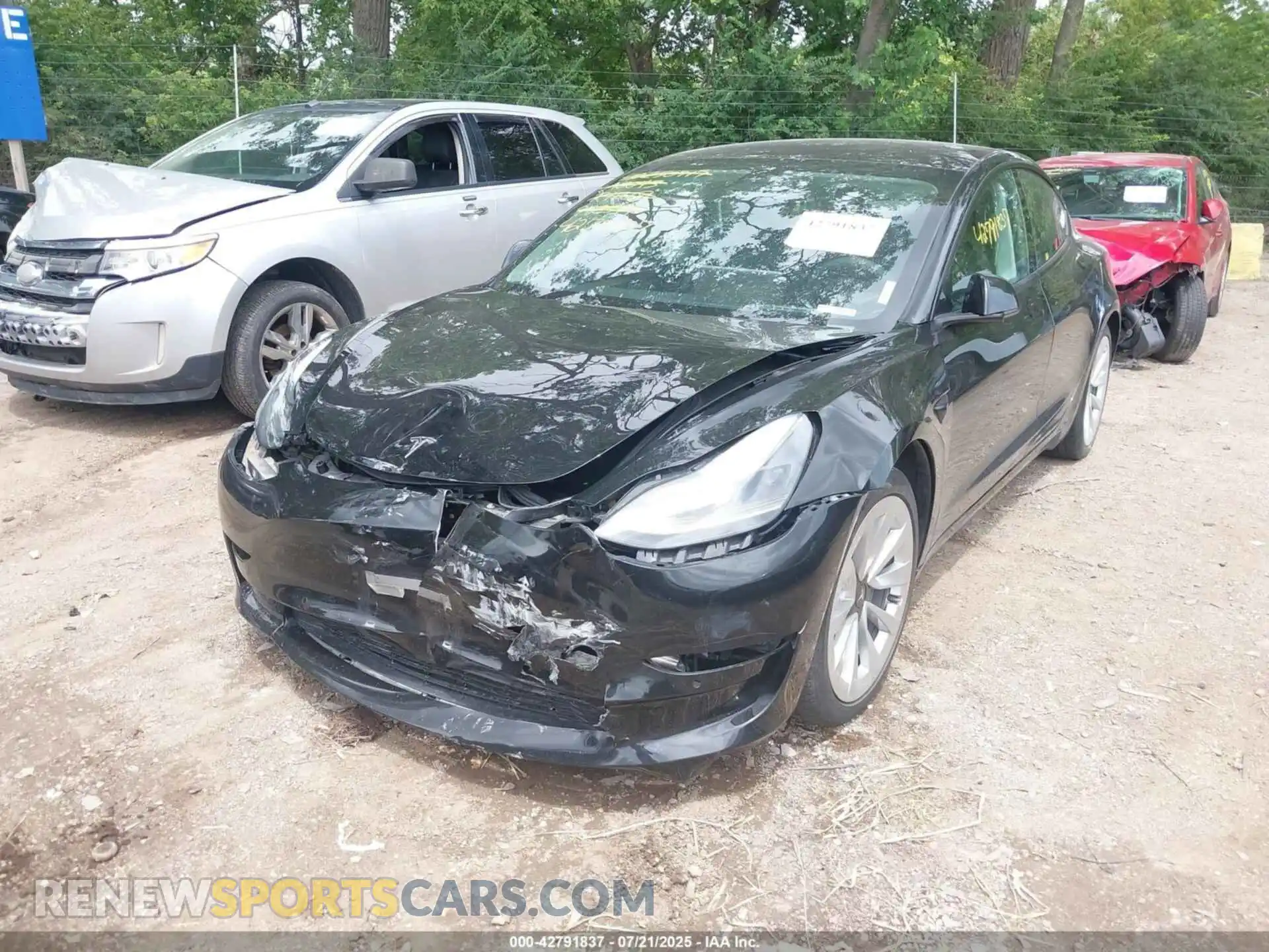 2 Photograph of a damaged car 5YJ3E1EA2MF982594 TESLA MODEL 3 2021