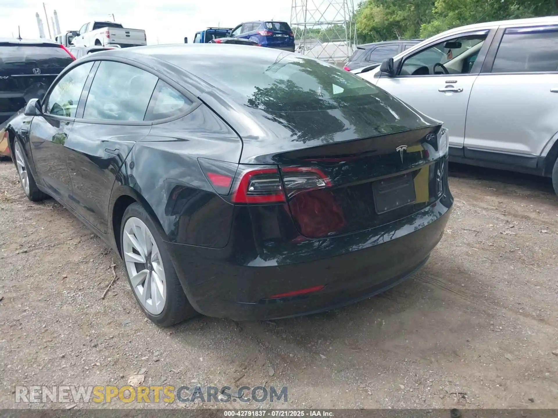 3 Photograph of a damaged car 5YJ3E1EA2MF982594 TESLA MODEL 3 2021