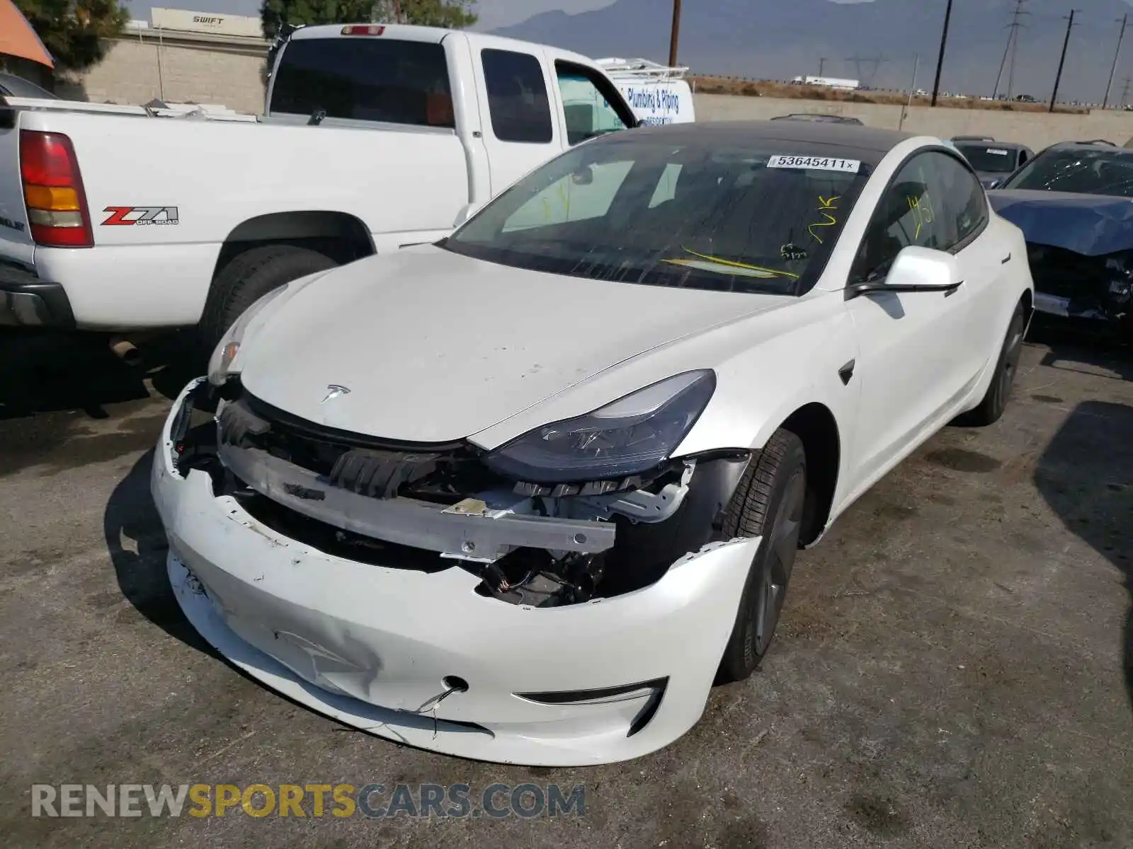 2 Photograph of a damaged car 5YJ3E1EA2MF992557 TESLA MODEL 3 2021
