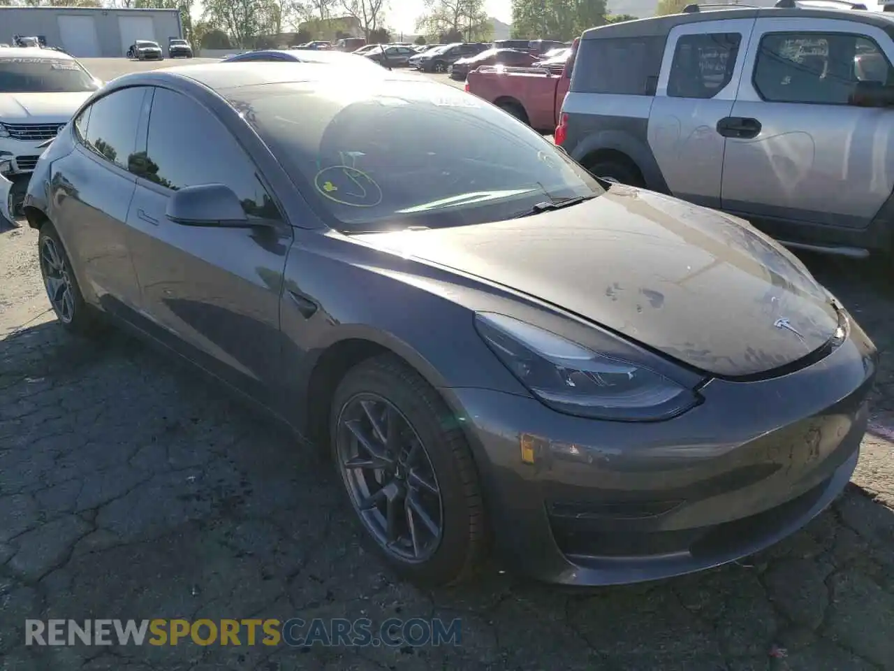 1 Photograph of a damaged car 5YJ3E1EA3MF051618 TESLA MODEL 3 2021