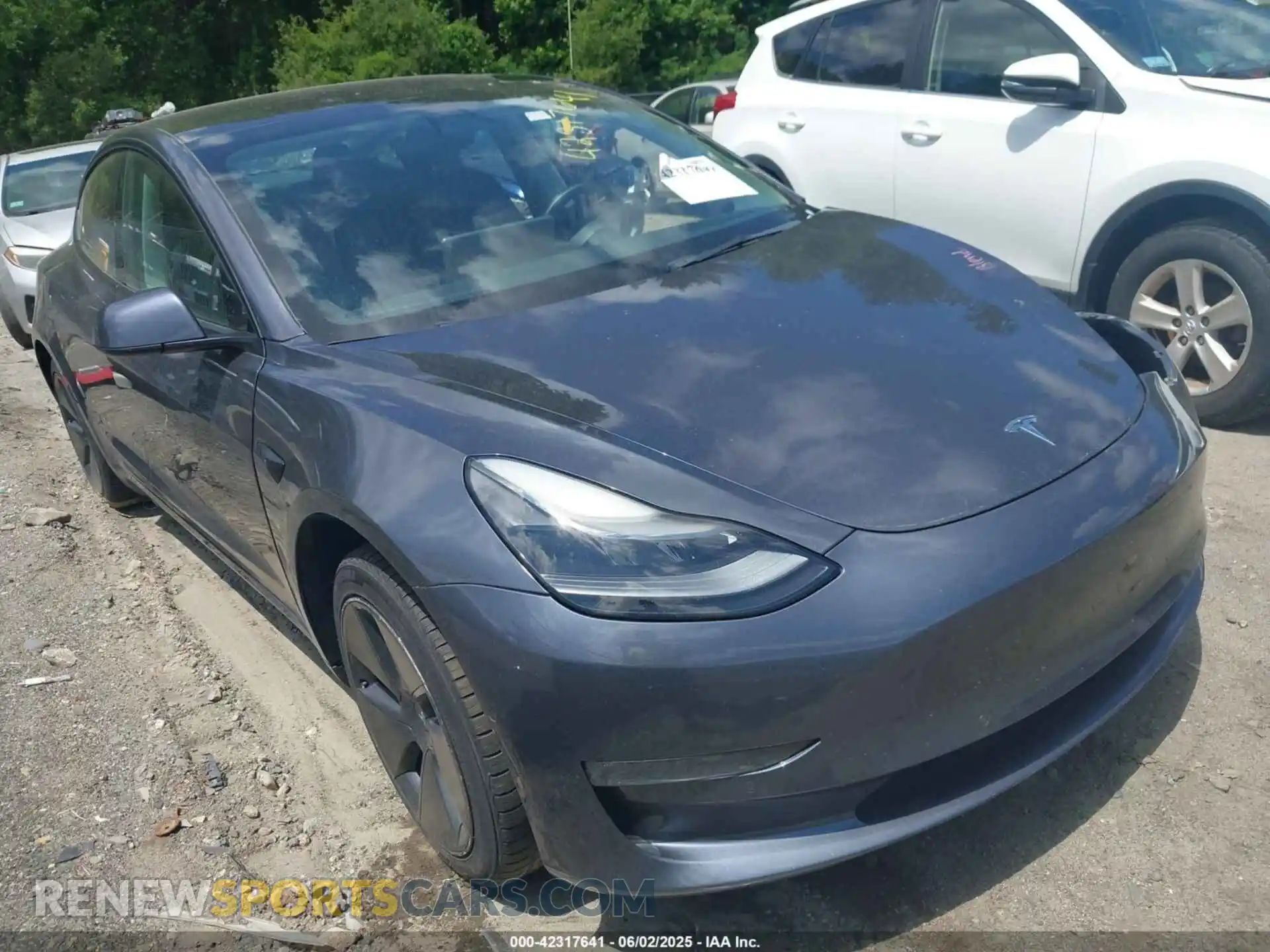 1 Photograph of a damaged car 5YJ3E1EA3MF086885 TESLA MODEL 3 2021