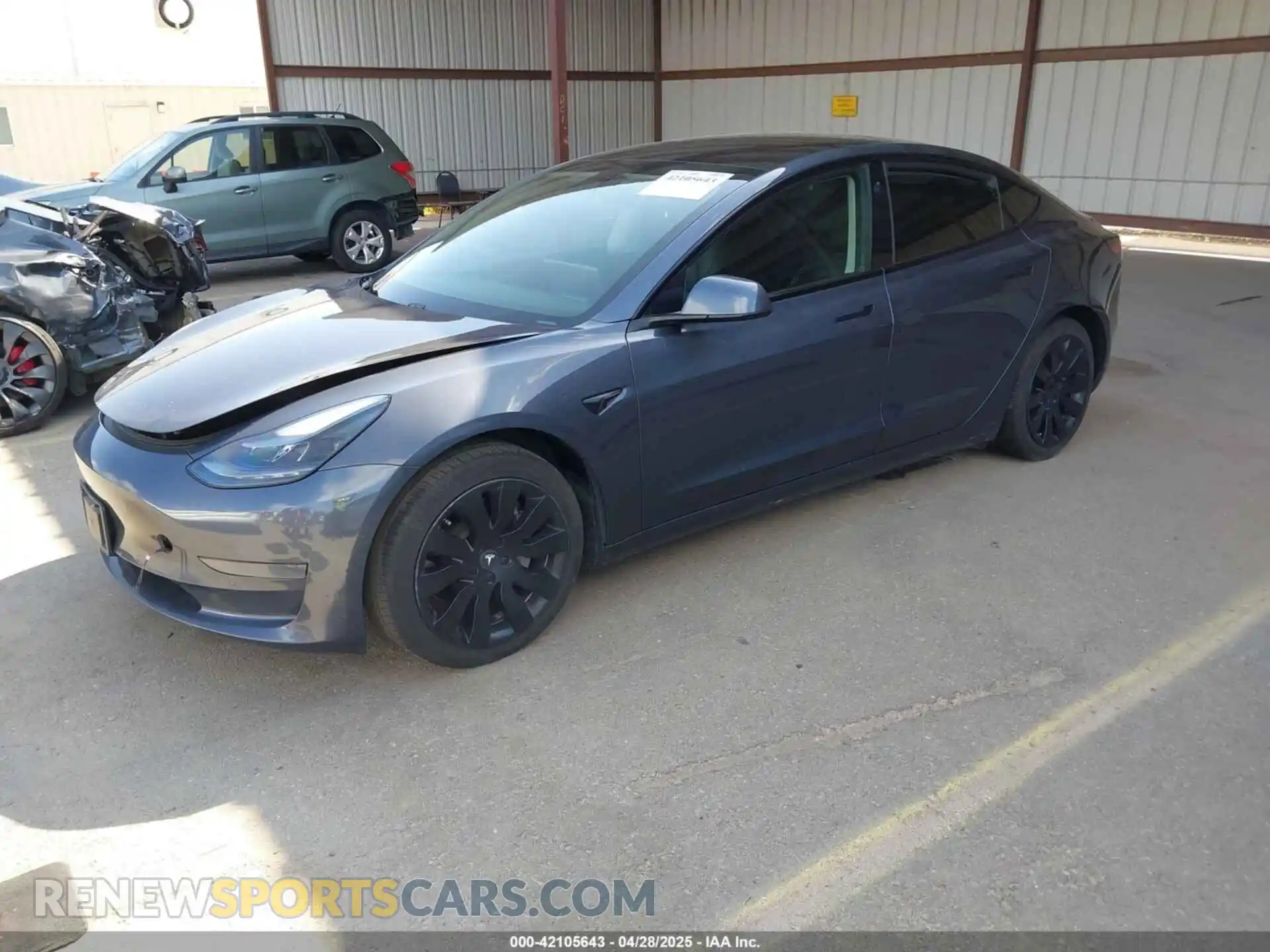 2 Photograph of a damaged car 5YJ3E1EA3MF877790 TESLA MODEL 3 2021