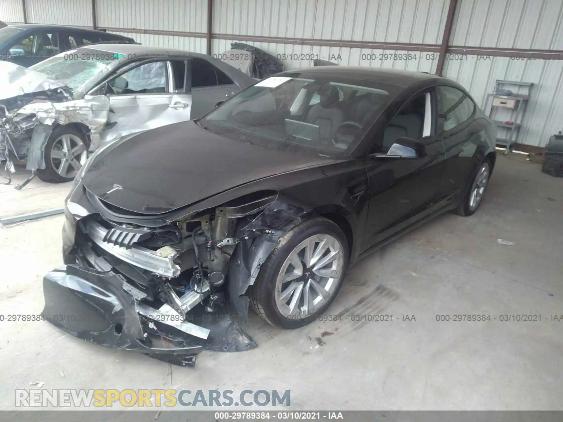 2 Photograph of a damaged car 5YJ3E1EA3MF908049 TESLA MODEL 3 2021