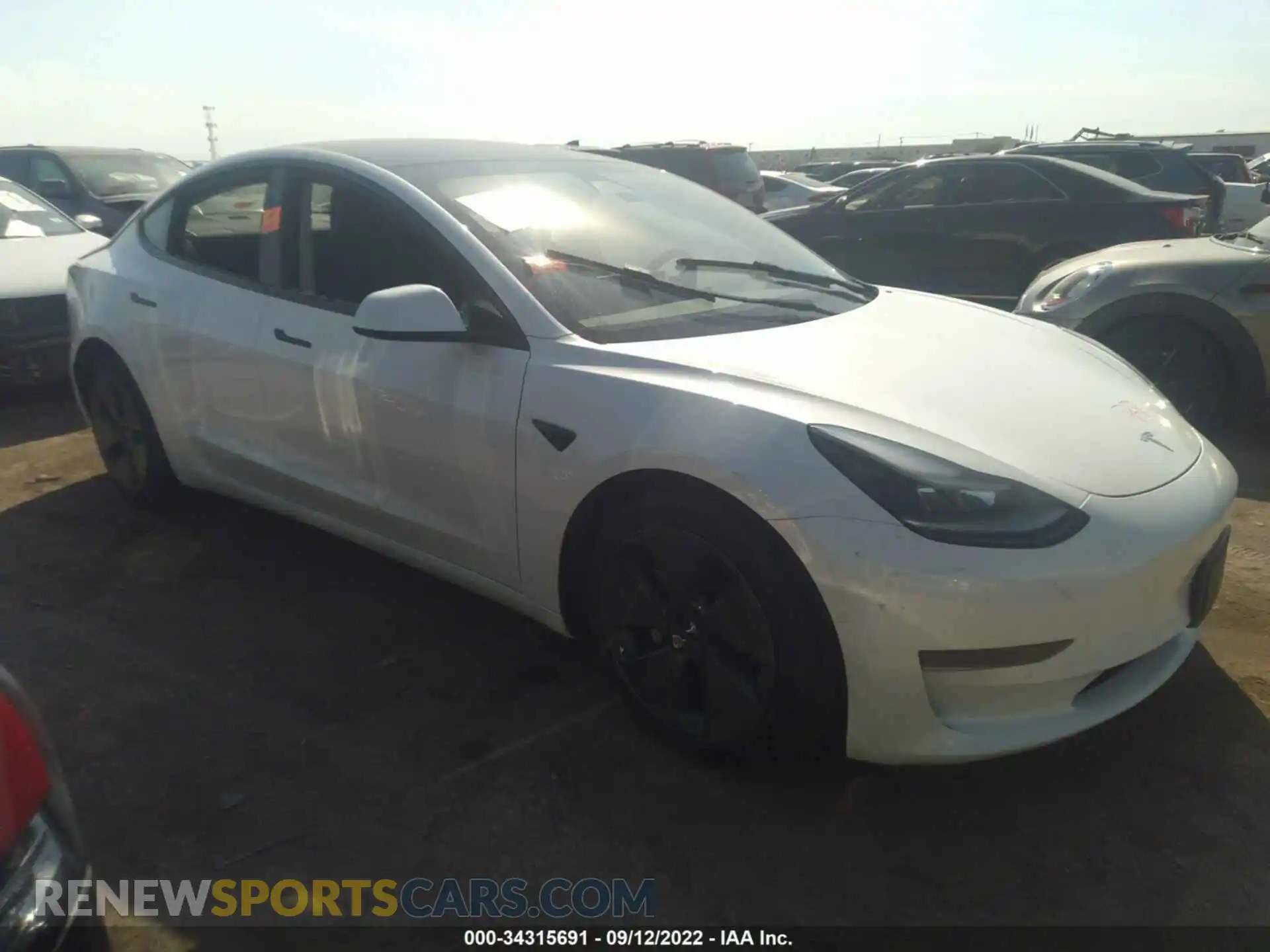 1 Photograph of a damaged car 5YJ3E1EA3MF989022 TESLA MODEL 3 2021