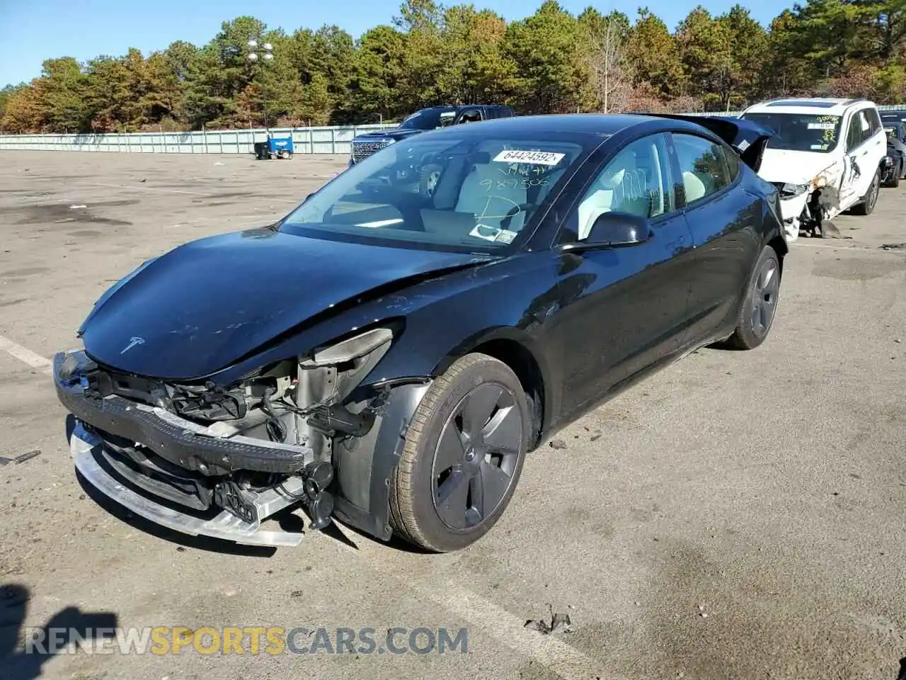 2 Photograph of a damaged car 5YJ3E1EA3MF989506 TESLA MODEL 3 2021