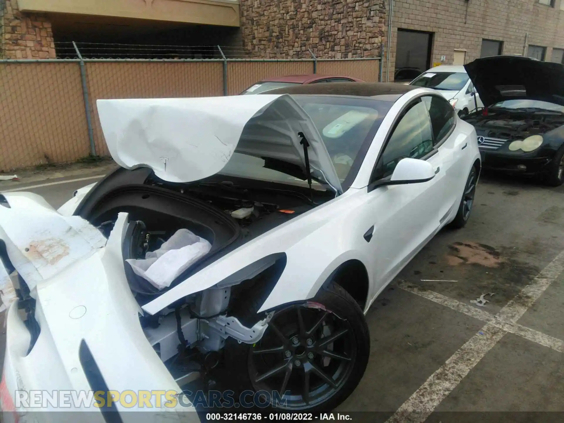 2 Photograph of a damaged car 5YJ3E1EA4MF021561 TESLA MODEL 3 2021