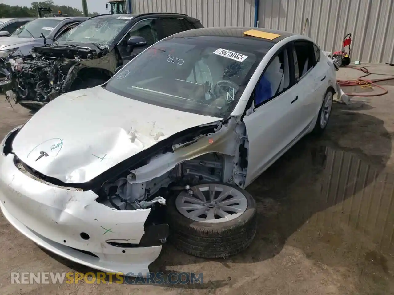 2 Photograph of a damaged car 5YJ3E1EA4MF032138 TESLA MODEL 3 2021