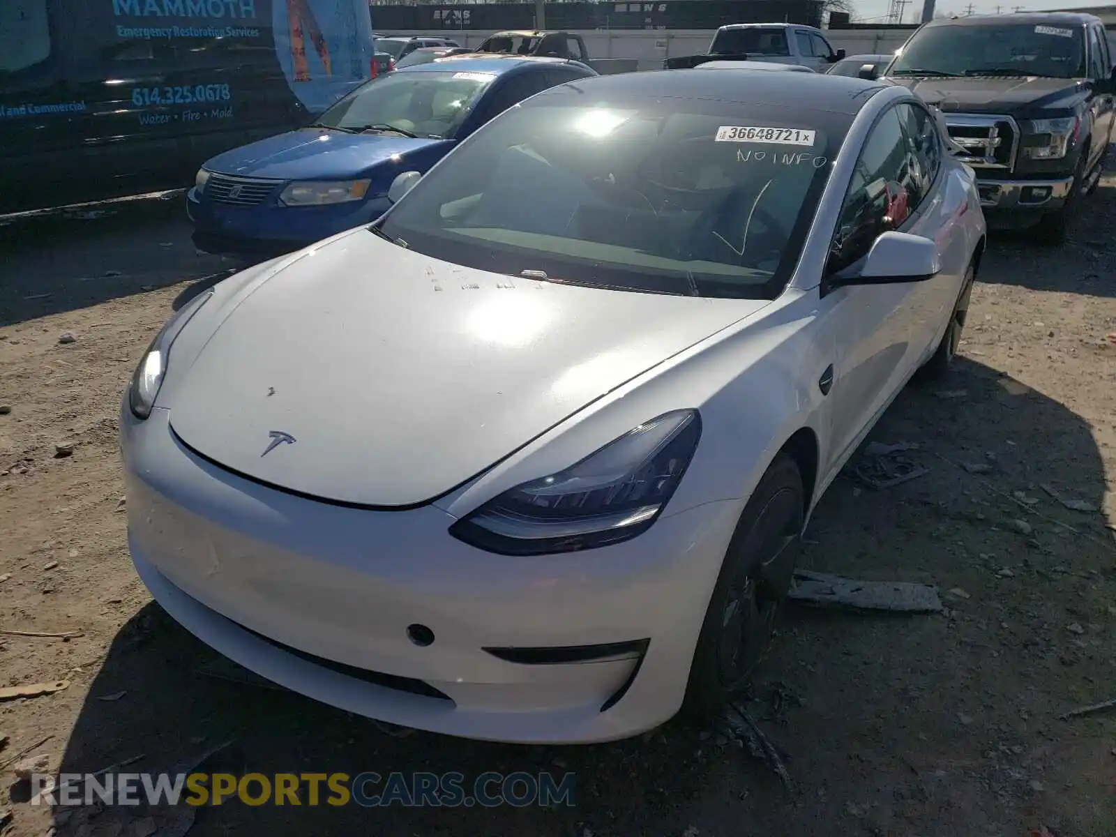 2 Photograph of a damaged car 5YJ3E1EA4MF853630 TESLA MODEL 3 2021