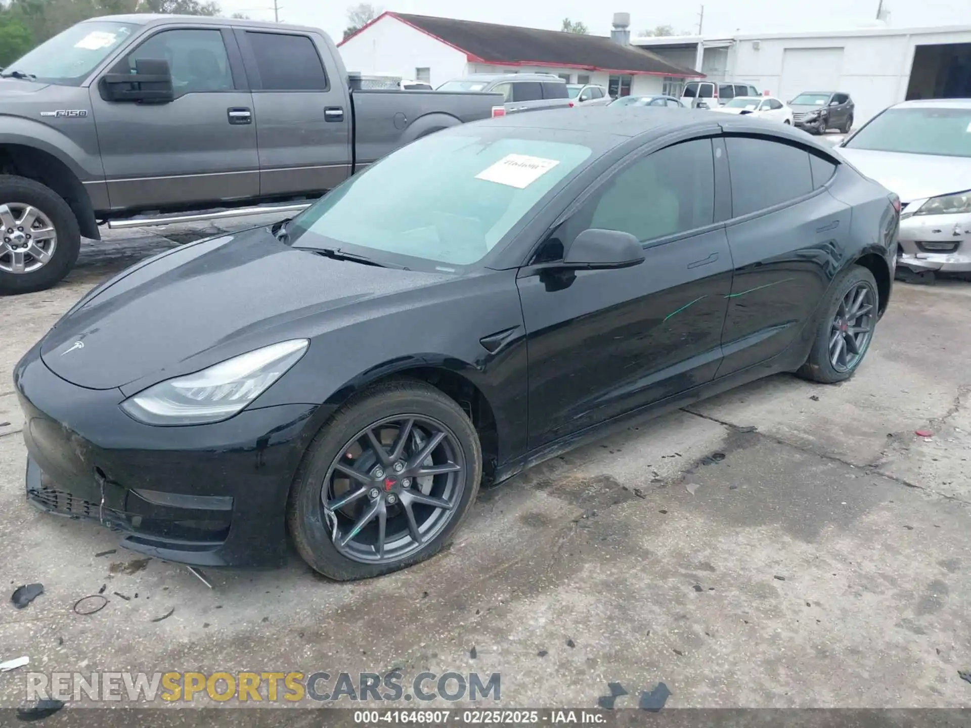2 Photograph of a damaged car 5YJ3E1EA4MF856821 TESLA MODEL 3 2021