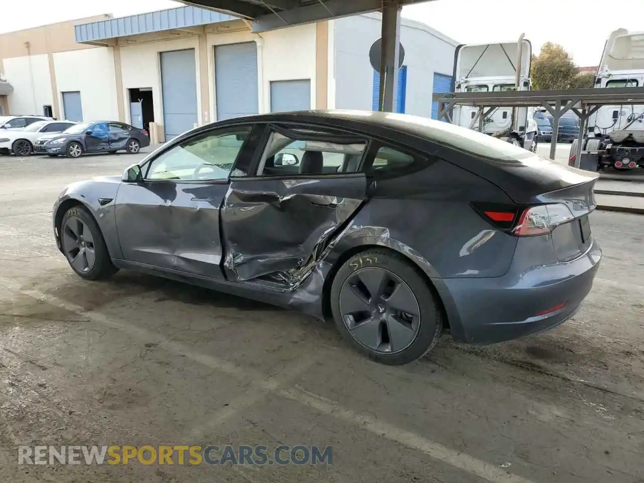 2 Photograph of a damaged car 5YJ3E1EA4MF876034 TESLA MODEL 3 2021