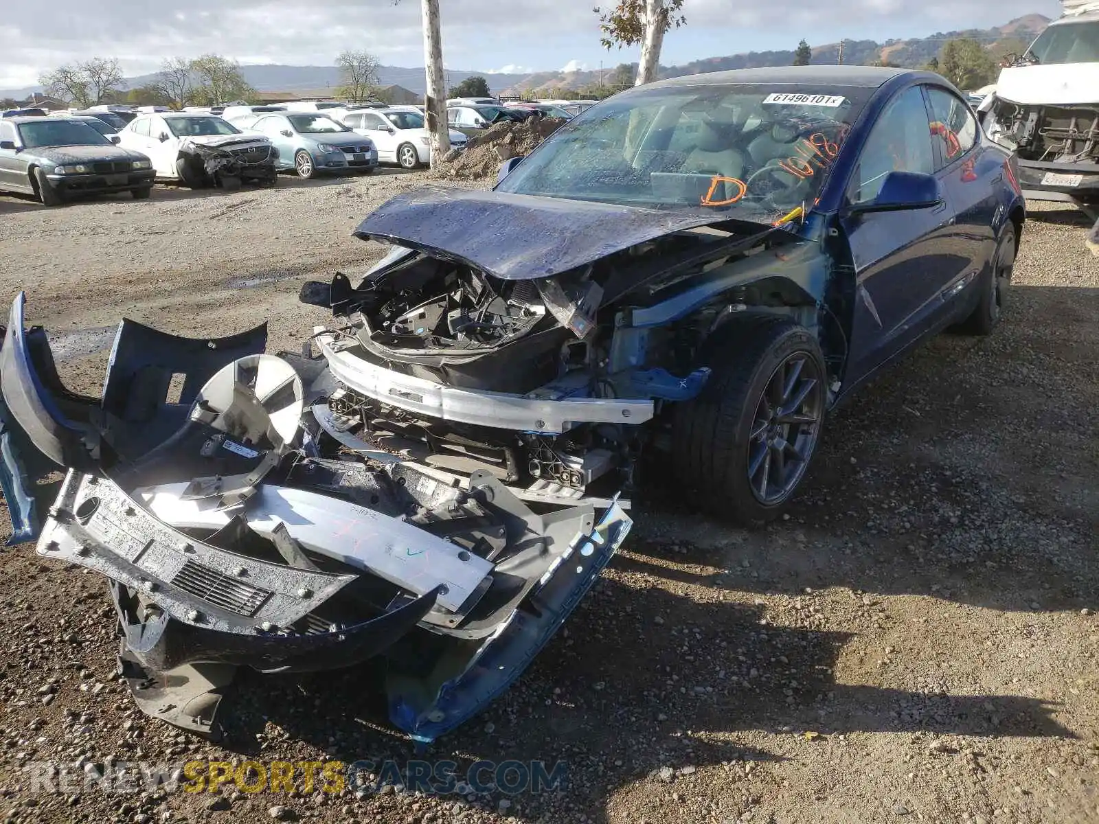 2 Photograph of a damaged car 5YJ3E1EA4MF877510 TESLA MODEL 3 2021