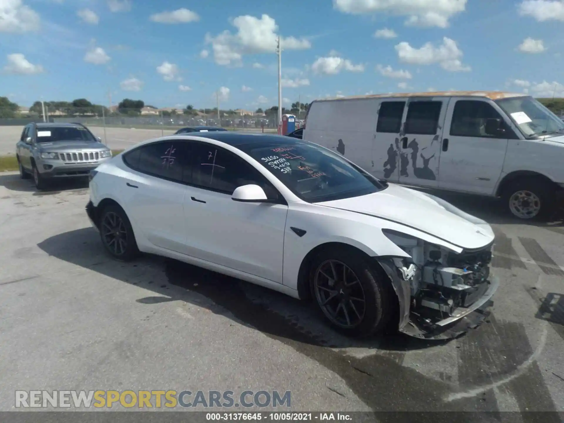1 Photograph of a damaged car 5YJ3E1EA4MF921165 TESLA MODEL 3 2021