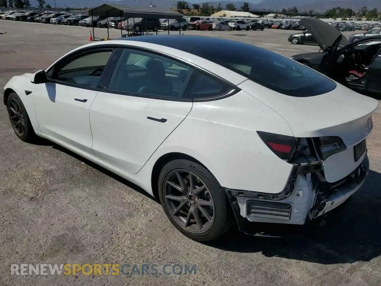 2 Photograph of a damaged car 5YJ3E1EA4MF976215 TESLA MODEL 3 2021