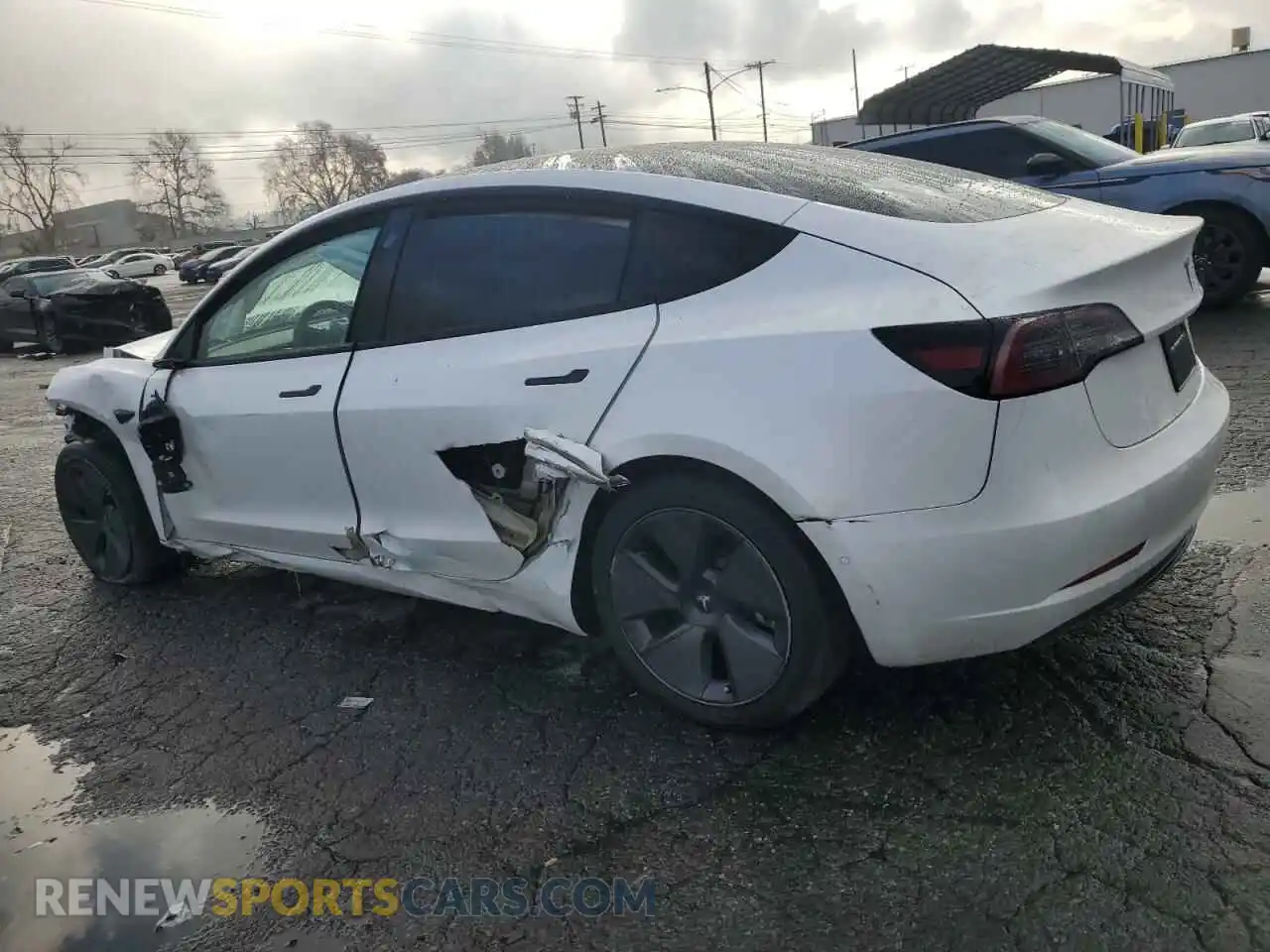 2 Photograph of a damaged car 5YJ3E1EA4MF976862 TESLA MODEL 3 2021
