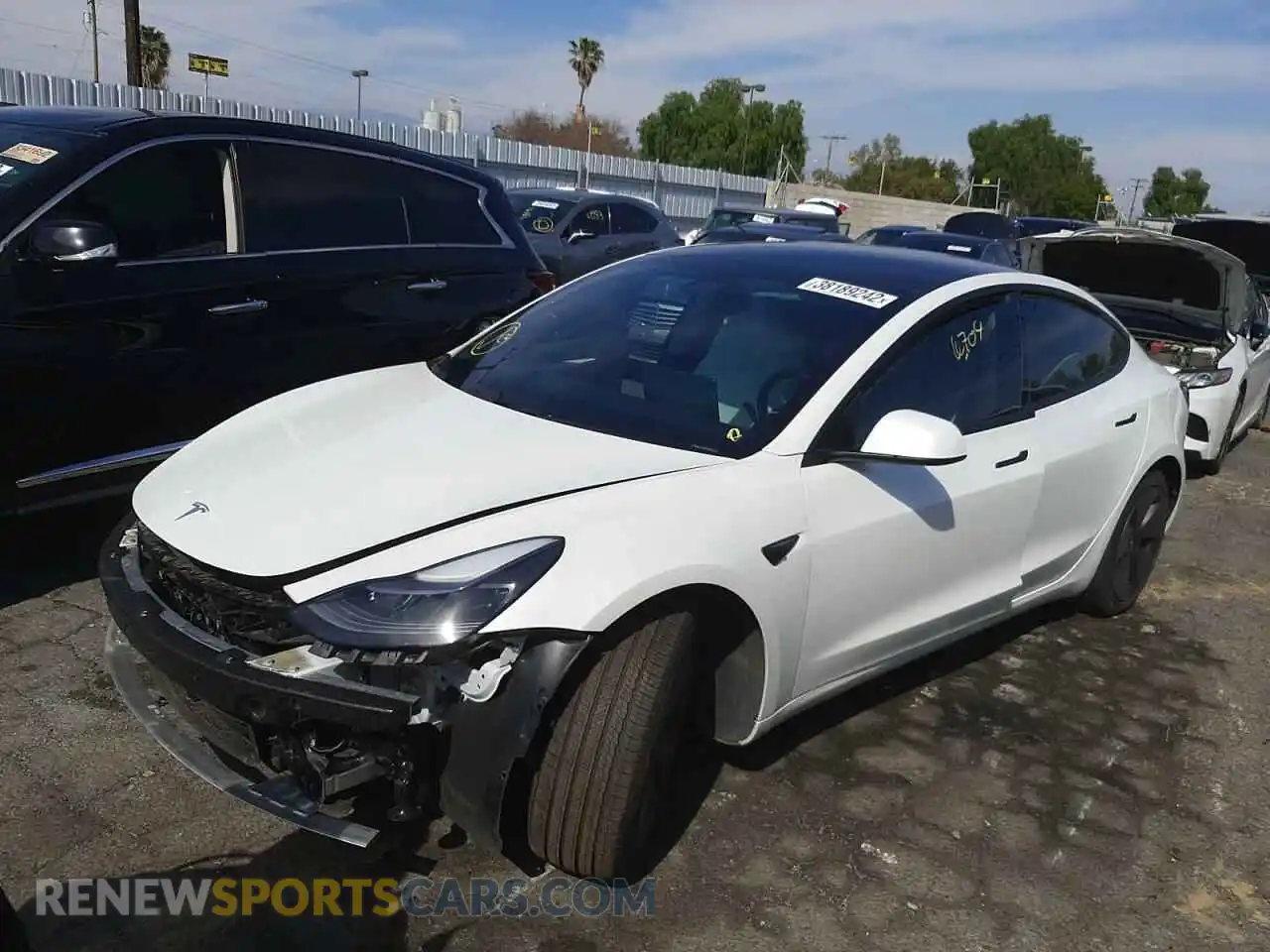 2 Photograph of a damaged car 5YJ3E1EA5MF000704 TESLA MODEL 3 2021