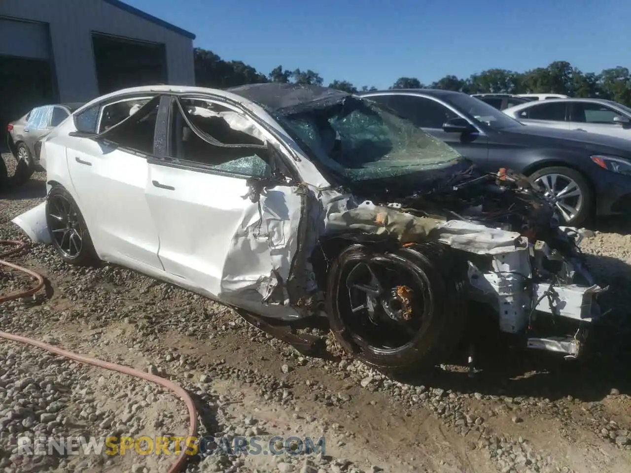 1 Photograph of a damaged car 5YJ3E1EA5MF060577 TESLA MODEL 3 2021