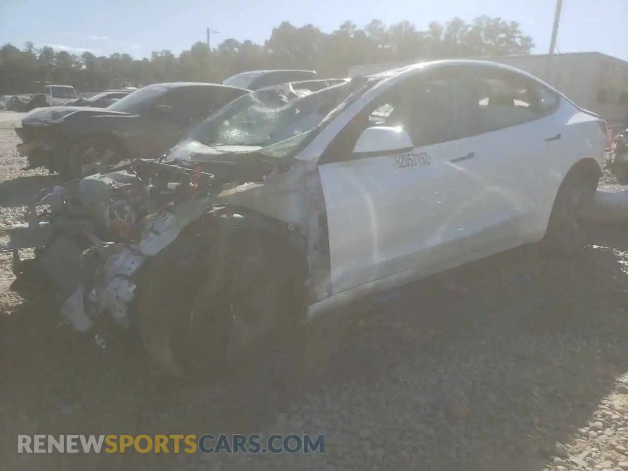 2 Photograph of a damaged car 5YJ3E1EA5MF060577 TESLA MODEL 3 2021