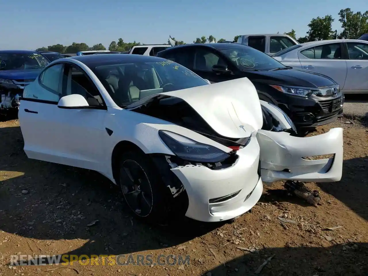 1 Photograph of a damaged car 5YJ3E1EA5MF090694 TESLA MODEL 3 2021