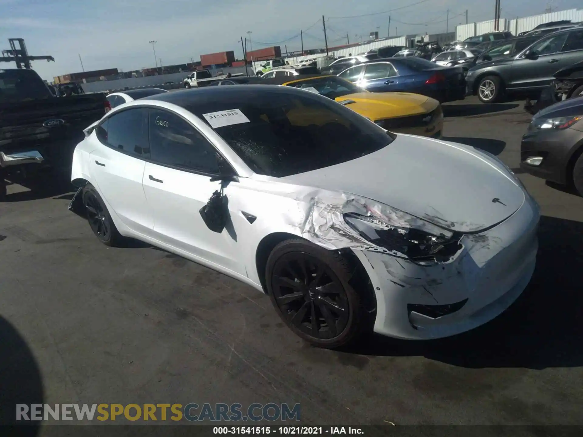 1 Photograph of a damaged car 5YJ3E1EA5MF874583 TESLA MODEL 3 2021