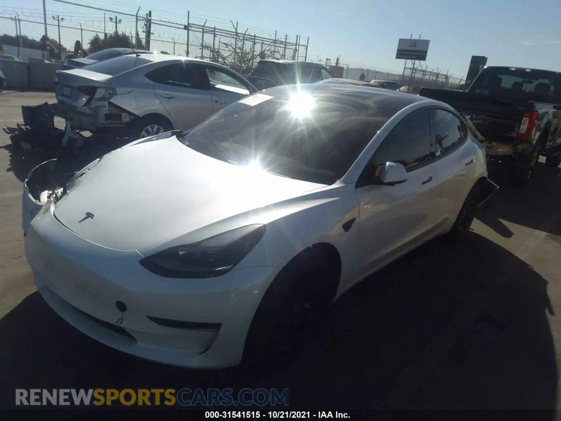 2 Photograph of a damaged car 5YJ3E1EA5MF874583 TESLA MODEL 3 2021