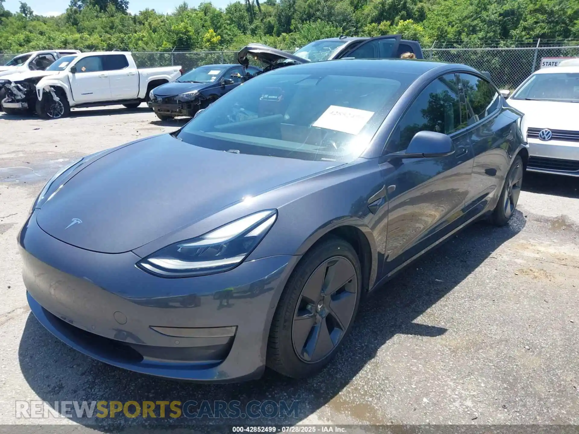 2 Photograph of a damaged car 5YJ3E1EA5MF969029 TESLA MODEL 3 2021
