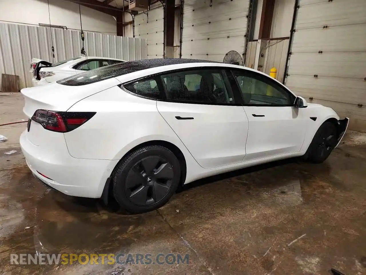3 Photograph of a damaged car 5YJ3E1EA5MF977499 TESLA MODEL 3 2021