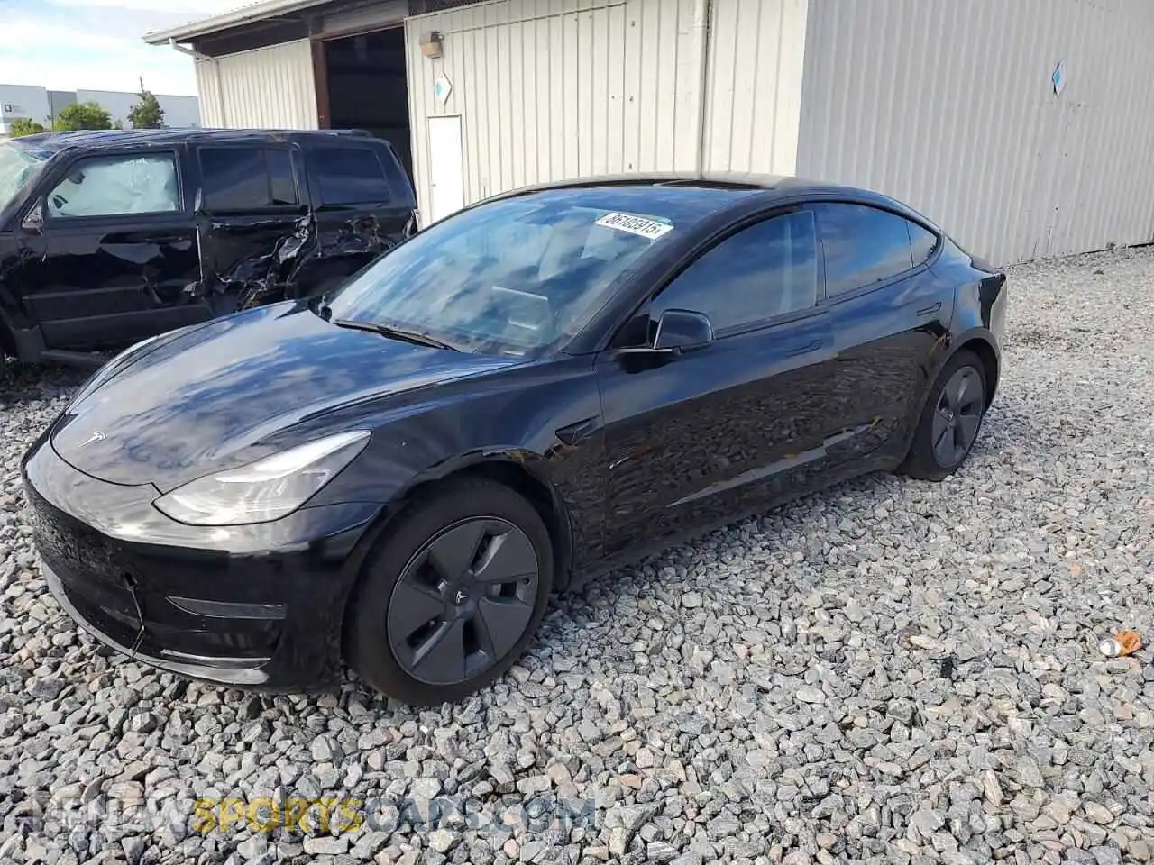 1 Photograph of a damaged car 5YJ3E1EA6MF092244 TESLA MODEL 3 2021