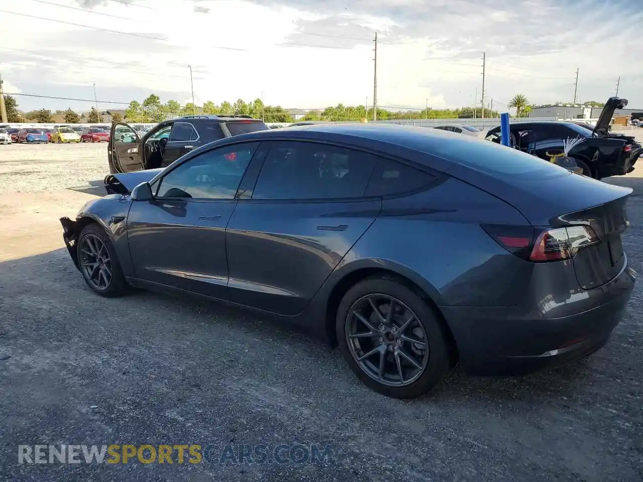 2 fotografías del automóvil dañado 5YJ3E1EA6MF853578 TESLA MODEL 3 2021