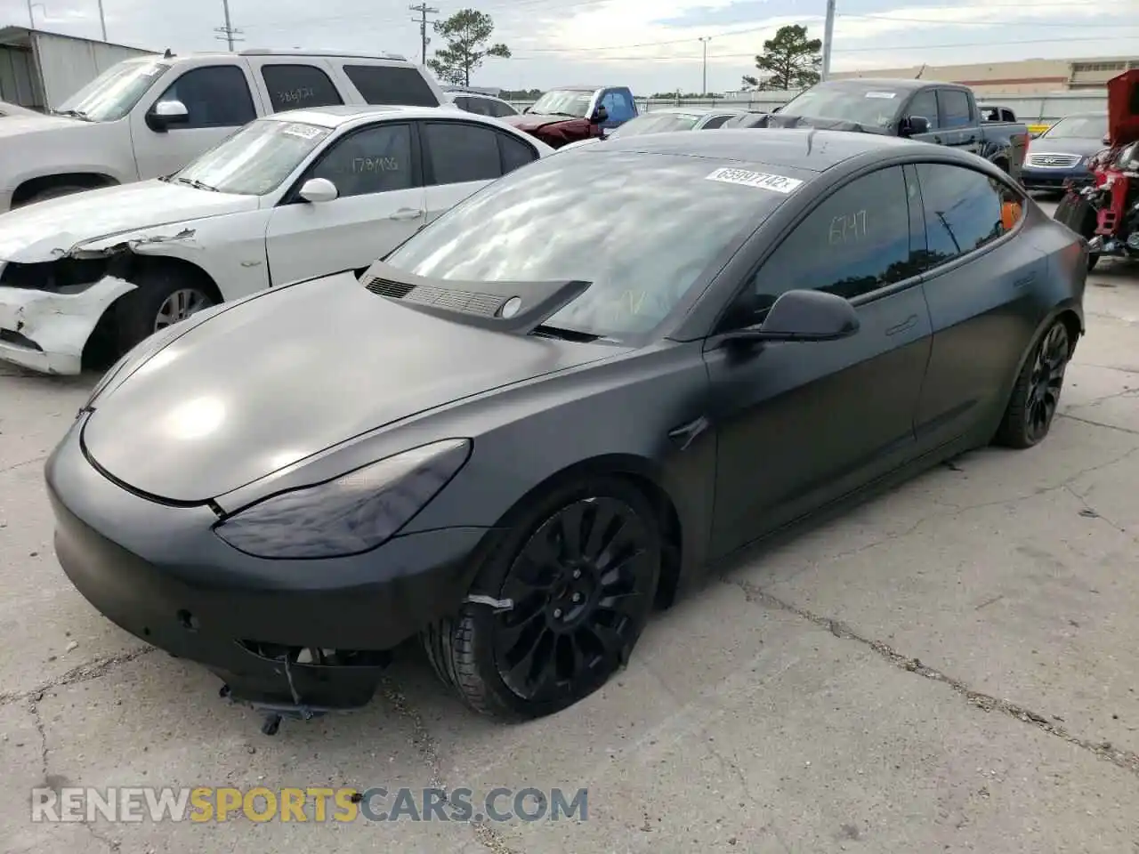 2 Photograph of a damaged car 5YJ3E1EA6MF871160 TESLA MODEL 3 2021