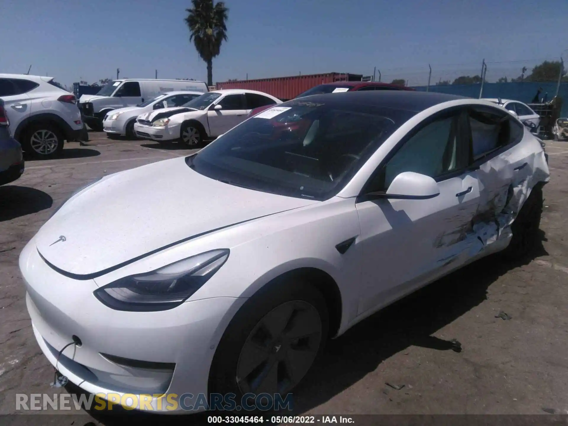 2 Photograph of a damaged car 5YJ3E1EA6MF876987 TESLA MODEL 3 2021