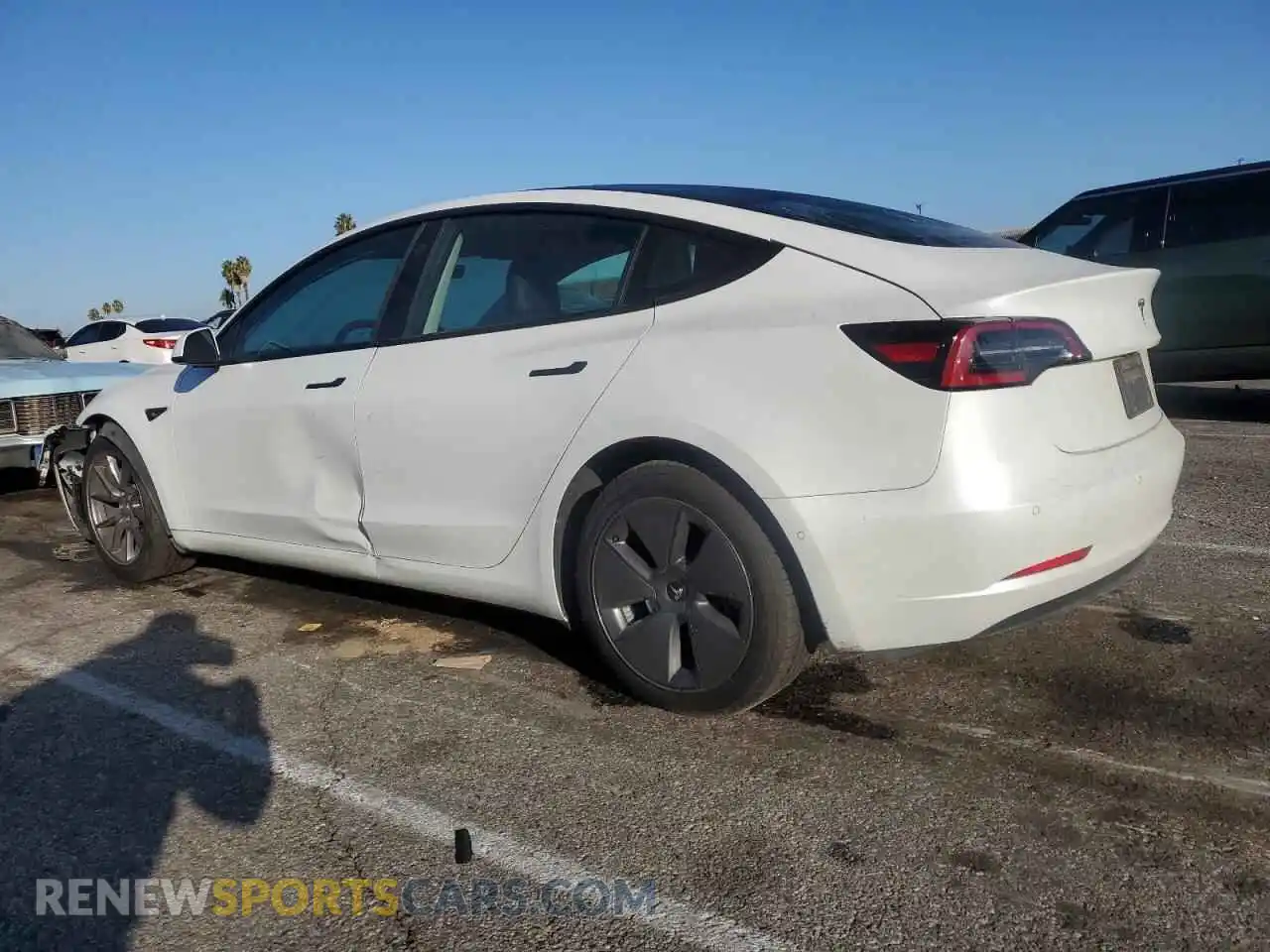 2 Photograph of a damaged car 5YJ3E1EA6MF877024 TESLA MODEL 3 2021