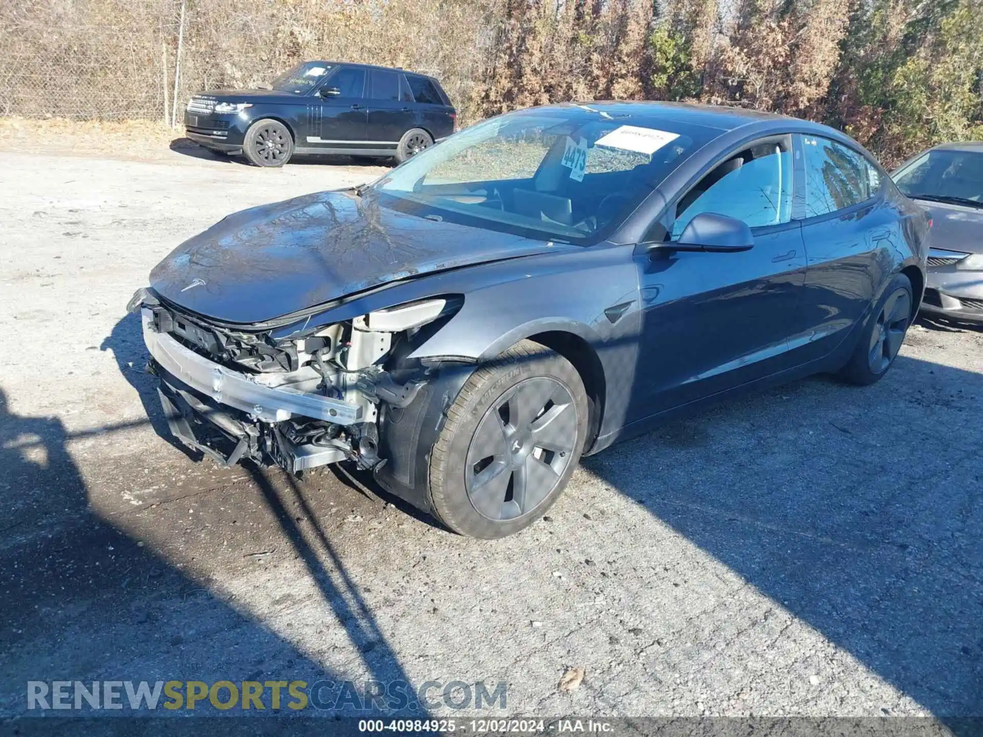 2 Photograph of a damaged car 5YJ3E1EA6MF976734 TESLA MODEL 3 2021