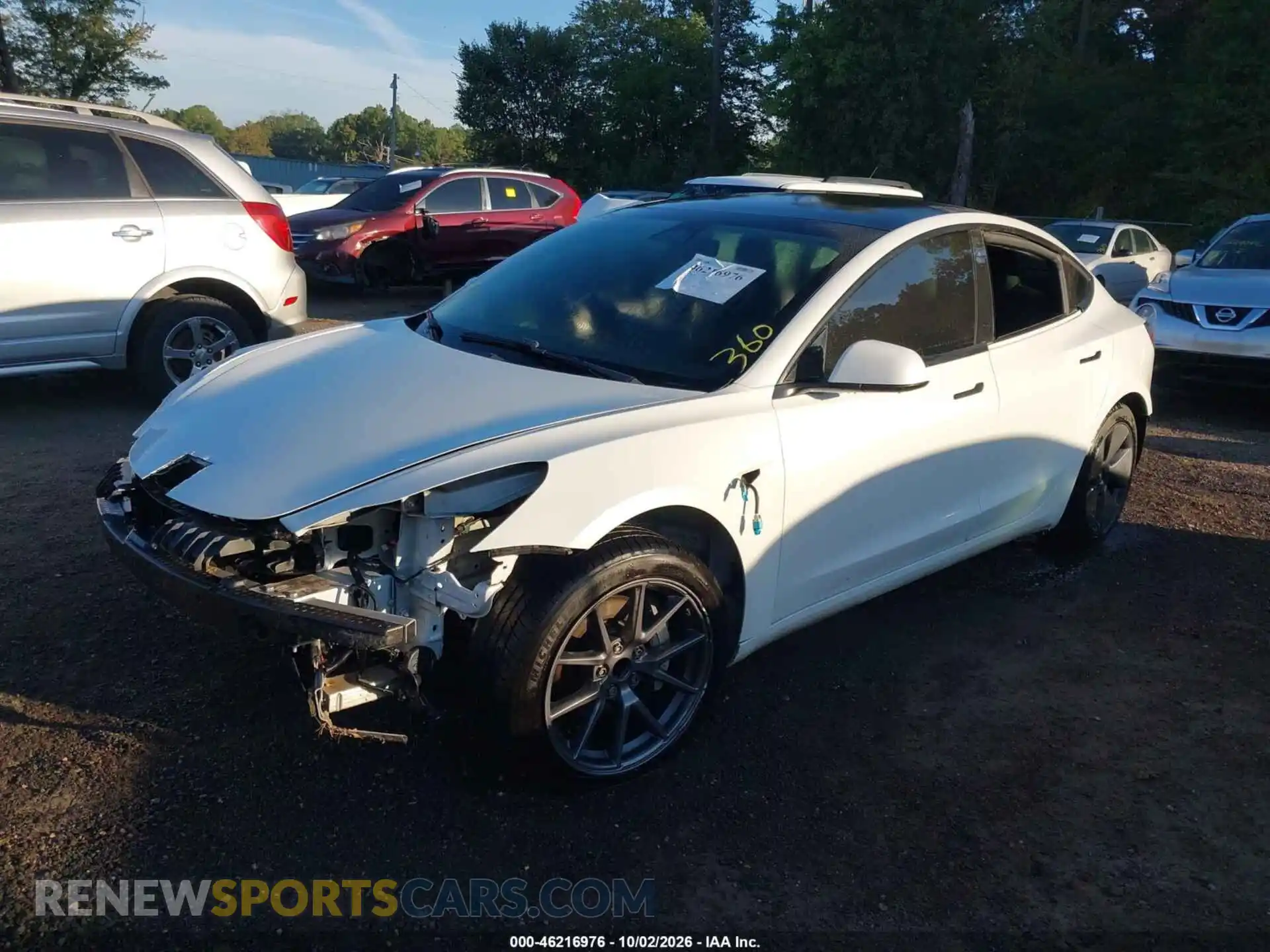 2 Photograph of a damaged car 5YJ3E1EA6MF976863 TESLA MODEL 3 2021
