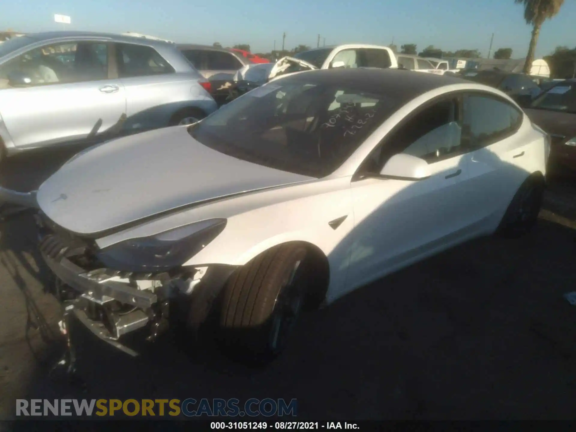 2 Photograph of a damaged car 5YJ3E1EA6MF997891 TESLA MODEL 3 2021