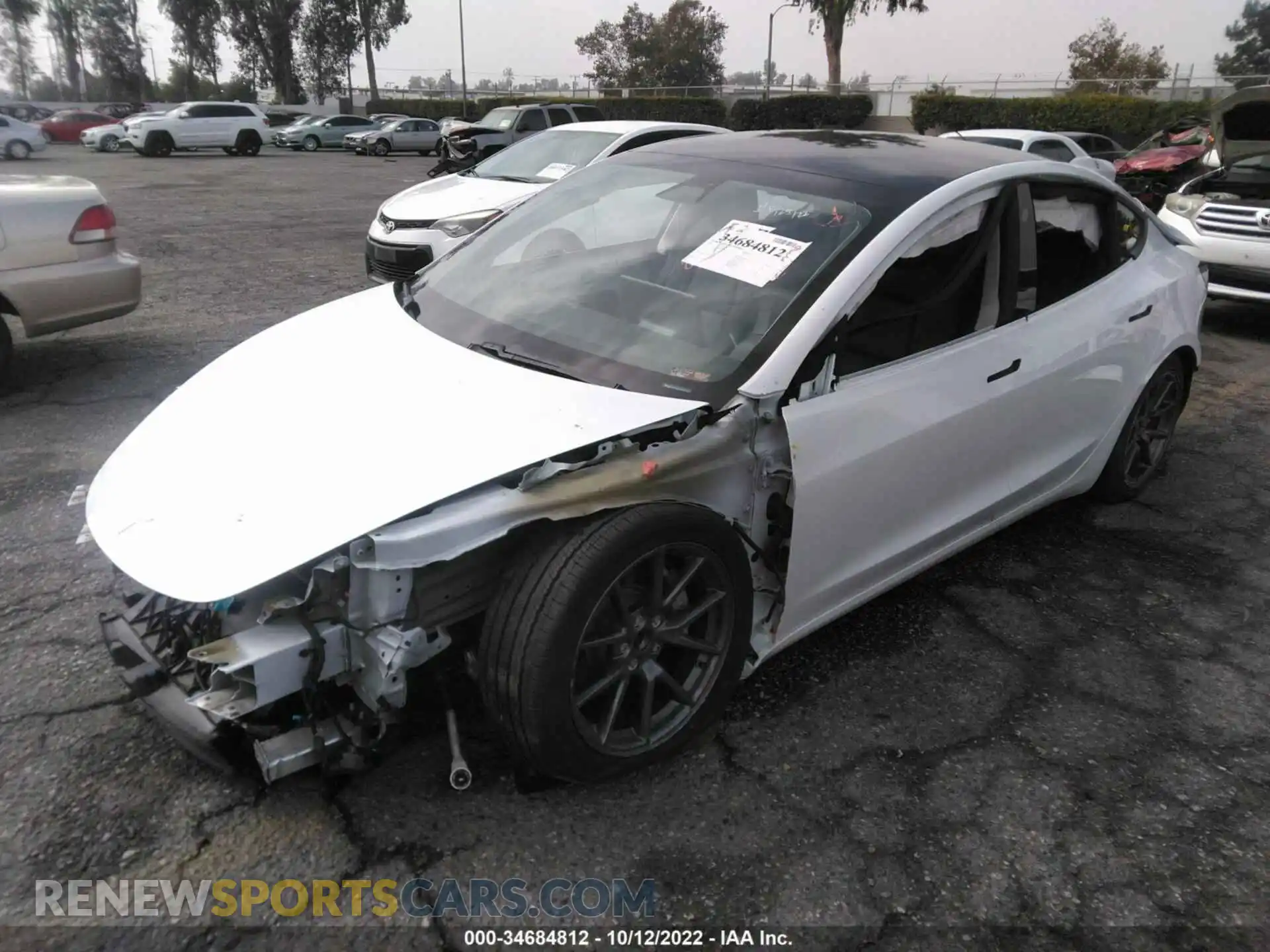 2 fotografías del automóvil dañado 5YJ3E1EA7MF922360 TESLA MODEL 3 2021