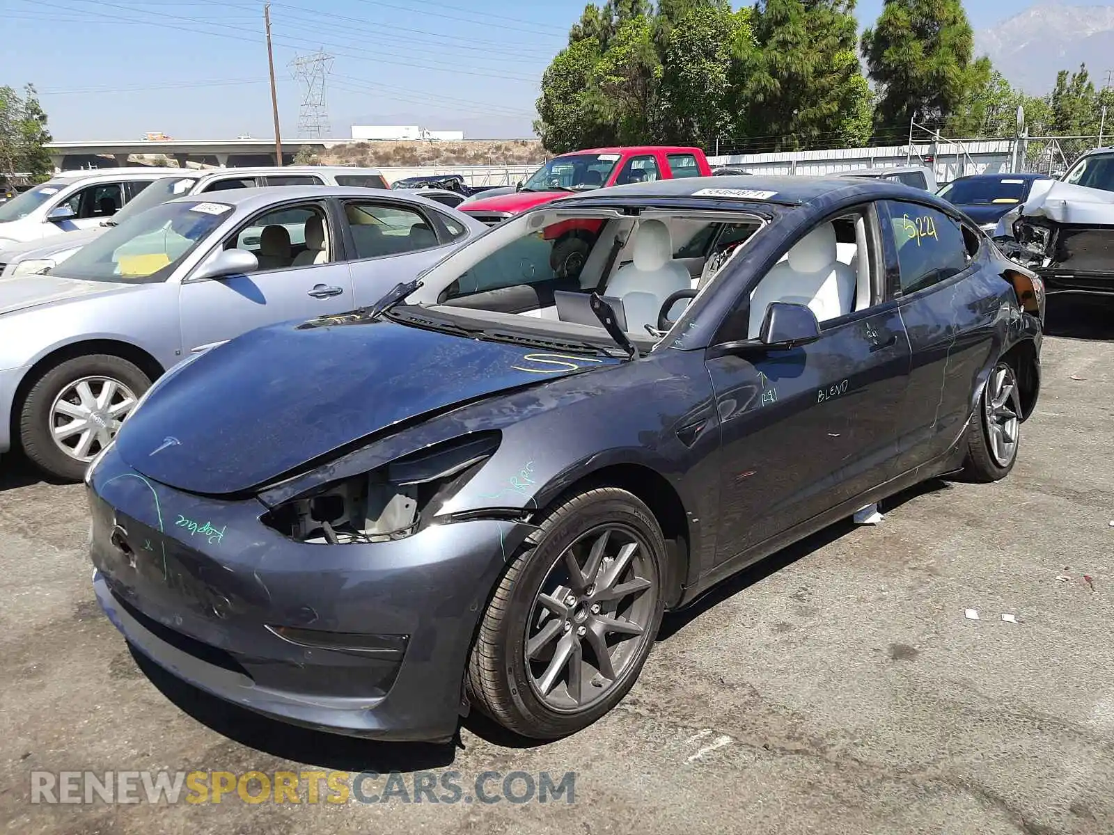 2 fotografías del automóvil dañado 5YJ3E1EA7MF938641 TESLA MODEL 3 2021