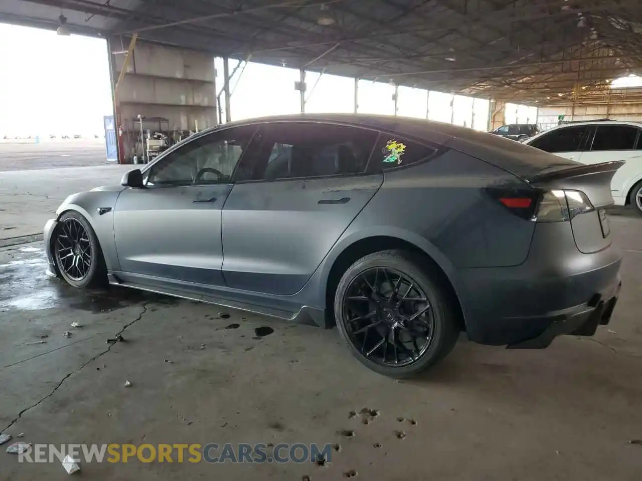 2 Photograph of a damaged car 5YJ3E1EA7MF990786 TESLA MODEL 3 2021