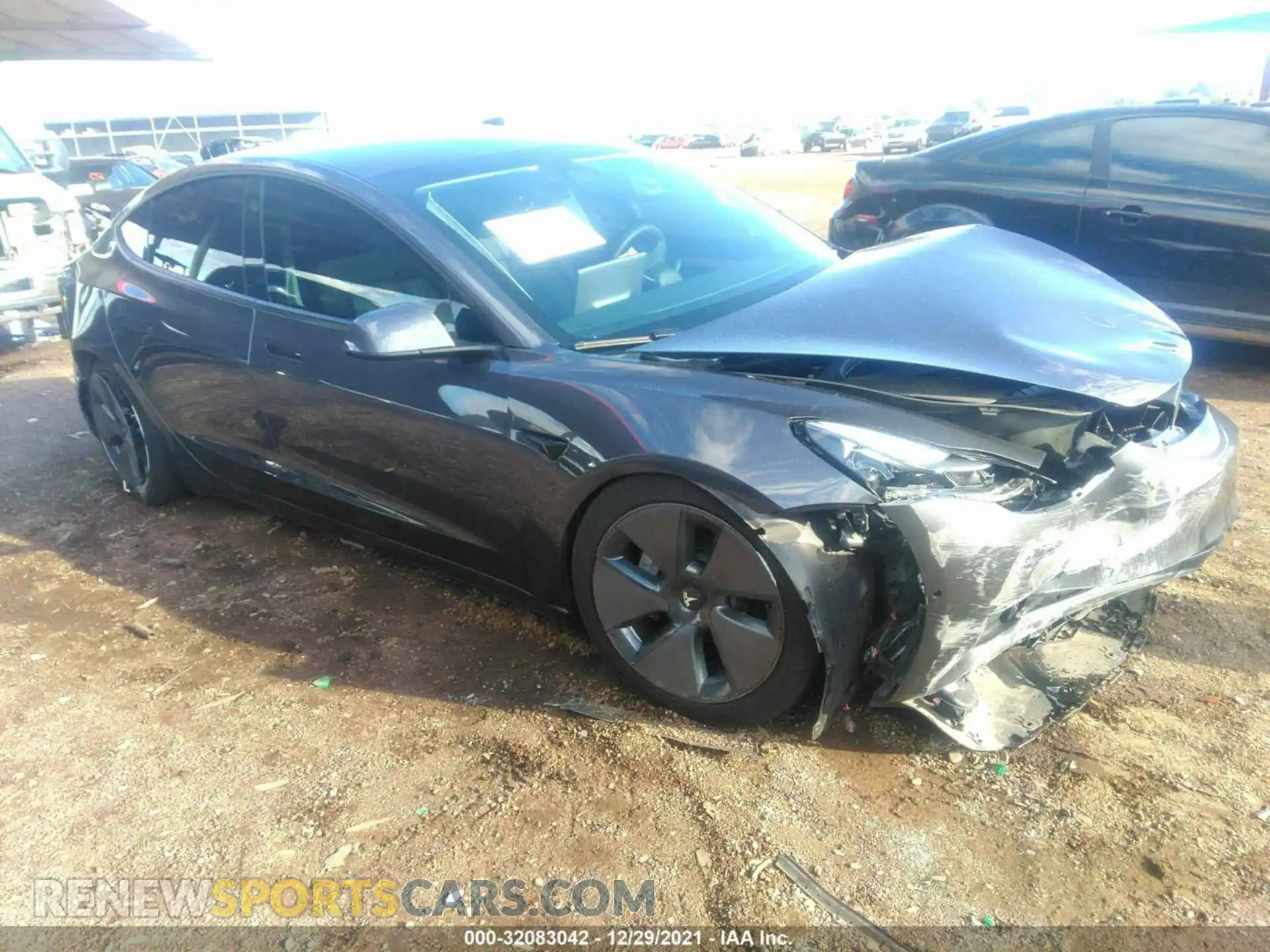 1 Photograph of a damaged car 5YJ3E1EA7MF994692 TESLA MODEL 3 2021