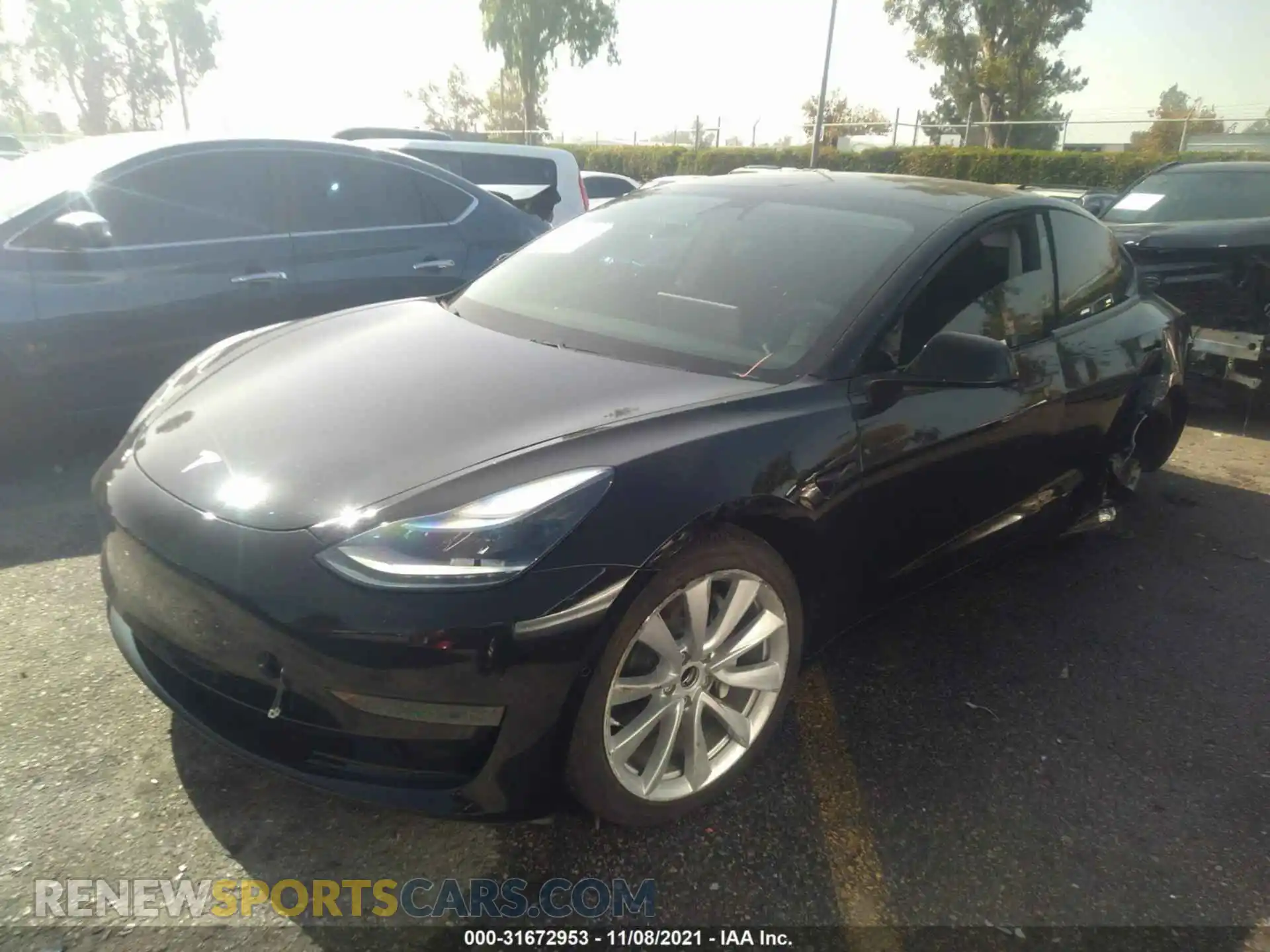 2 Photograph of a damaged car 5YJ3E1EA8MF982583 TESLA MODEL 3 2021