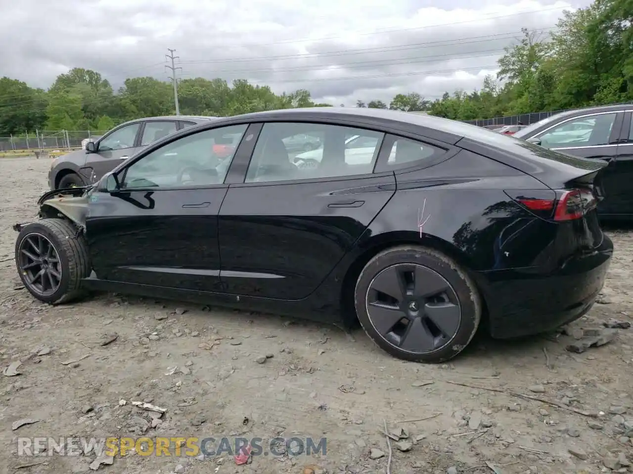 2 Photograph of a damaged car 5YJ3E1EA8MF991378 TESLA MODEL 3 2021