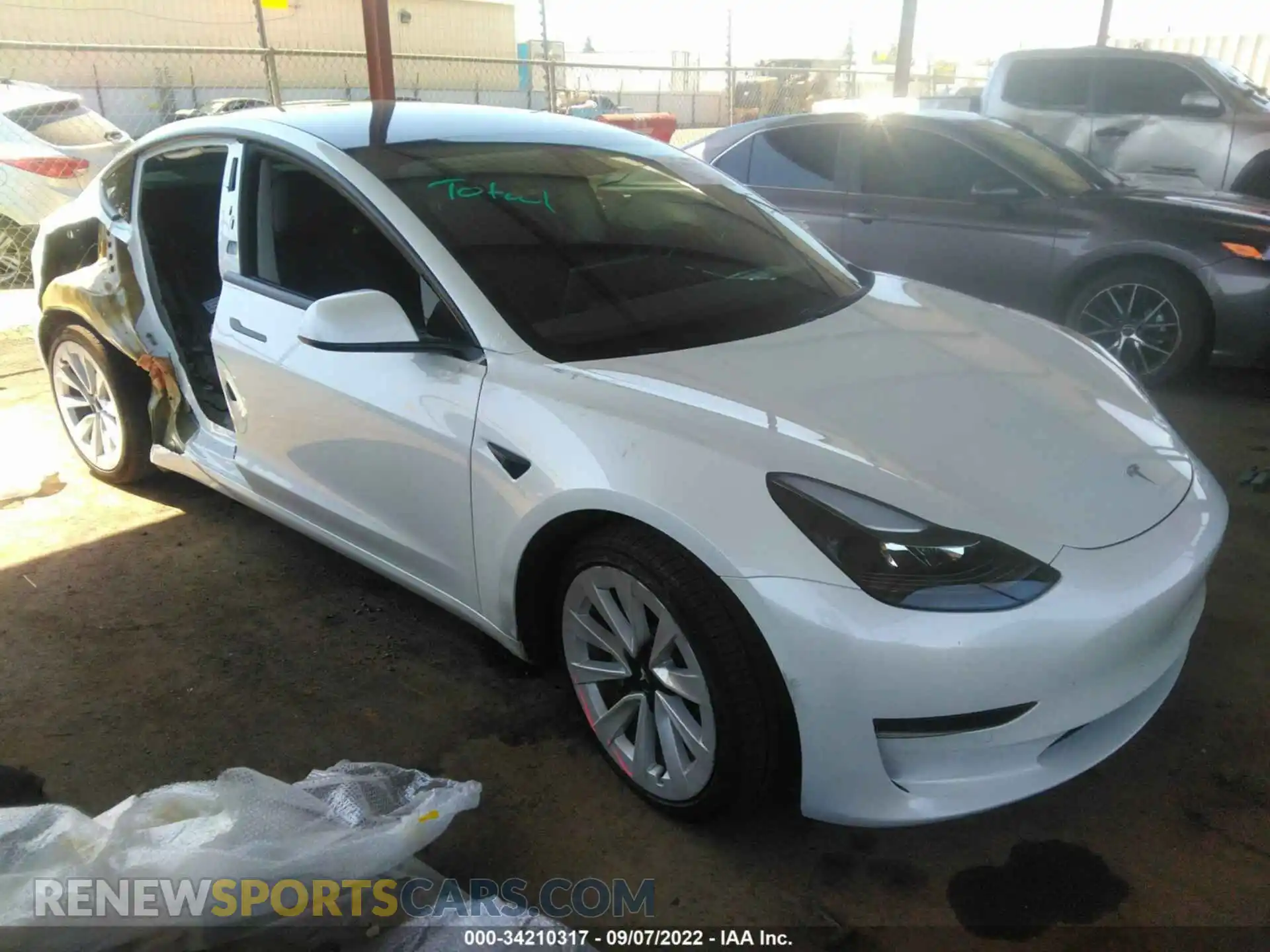 1 Photograph of a damaged car 5YJ3E1EA9MF018218 TESLA MODEL 3 2021