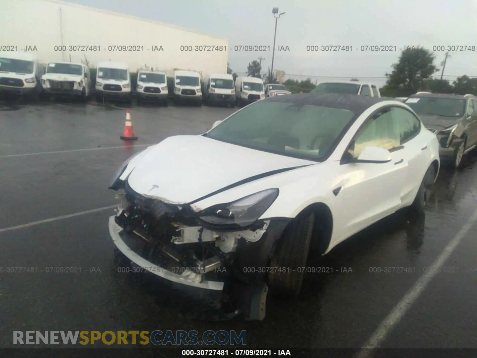 2 Photograph of a damaged car 5YJ3E1EA9MF915815 TESLA MODEL 3 2021