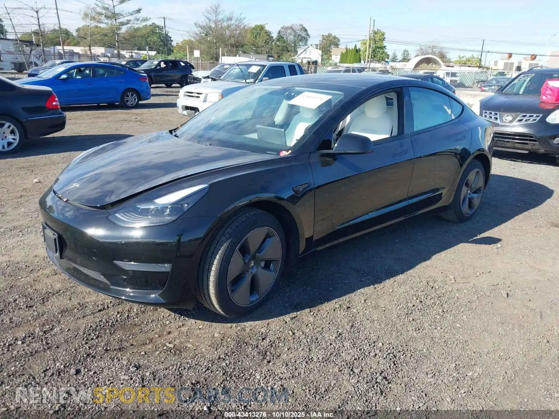 2 Photograph of a damaged car 5YJ3E1EA9MF915989 TESLA MODEL 3 2021