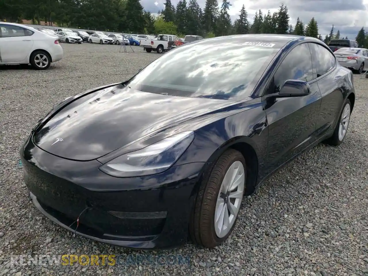 2 Photograph of a damaged car 5YJ3E1EA9MF995990 TESLA MODEL 3 2021