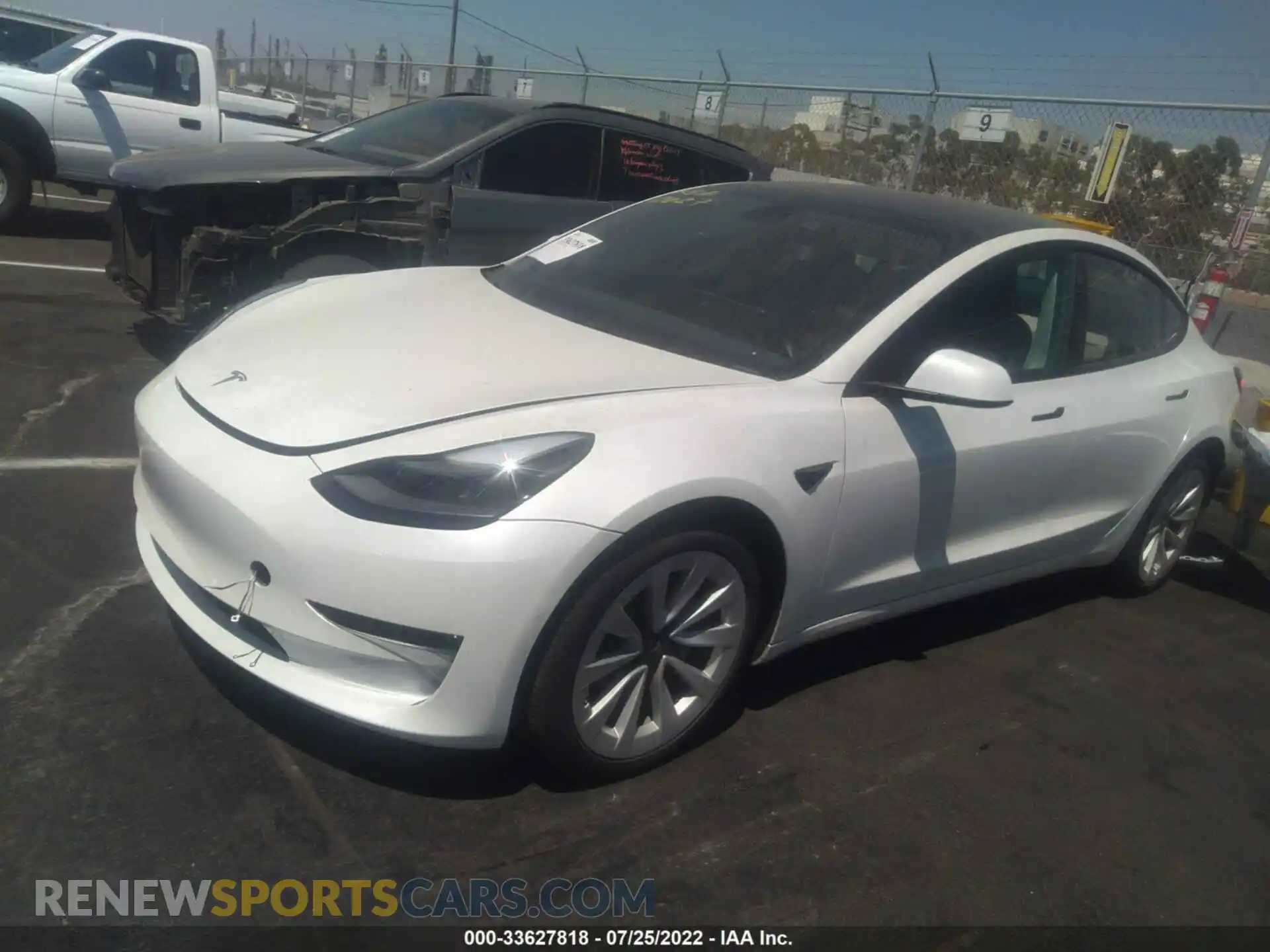 2 fotografías del automóvil dañado 5YJ3E1EAXMF084874 TESLA MODEL 3 2021