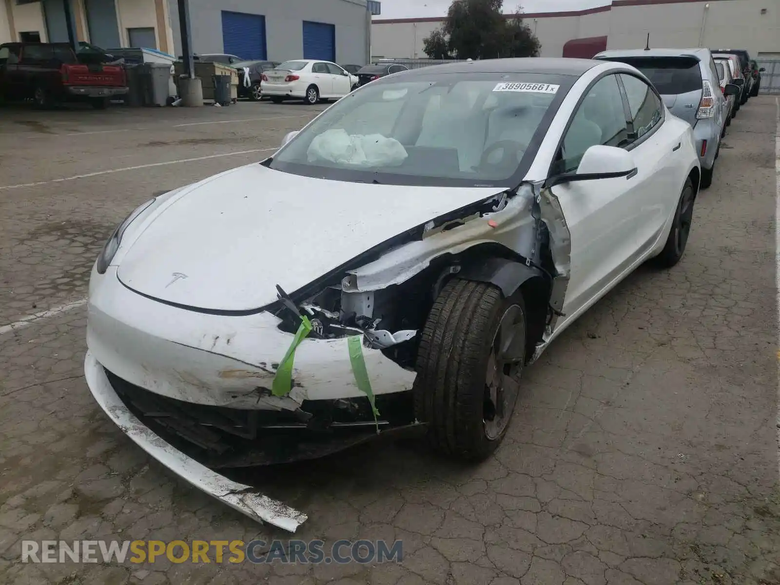 2 fotografías del automóvil dañado 5YJ3E1EAXMF858881 TESLA MODEL 3 2021