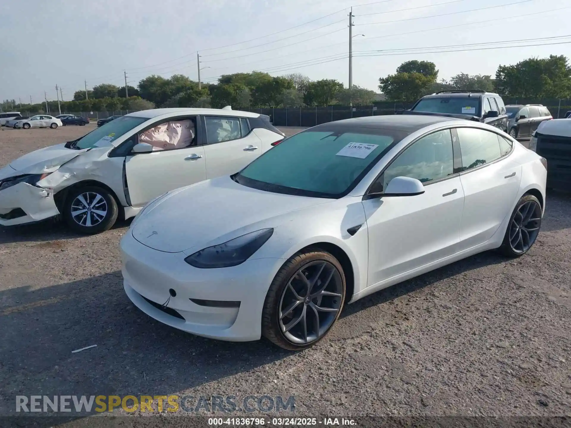 2 Photograph of a damaged car 5YJ3E1EAXMF908601 TESLA MODEL 3 2021